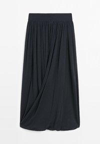 Long black skirt with wide waistband and gathered fabric creating soft pleats and a slight draped effect at the hem