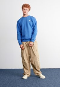 New Balance SPORT ESSENTIALS CREW UNISEX - Camisola - blue agate