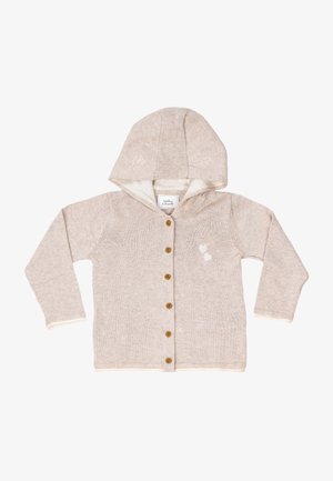 Maglione lavorato a maglia color beige chiaro con cappuccio, dotato di bottoni in legno e morbida fodera interna. Decorato con due piccoli cuori ricamati.