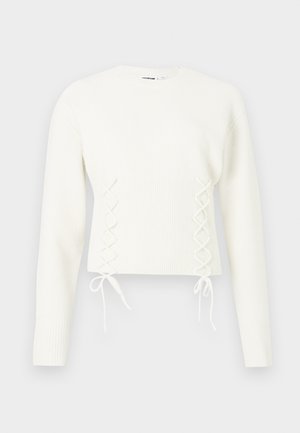 Witte langekous gebreide trui met geribbelde taille en kruislingse strikdetails aan de voorkant.