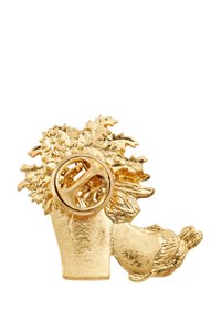 Gold-toned brooch shaped like a potted plant with intricate leaf and flower detailing, featuring a circular clasp for attachment.