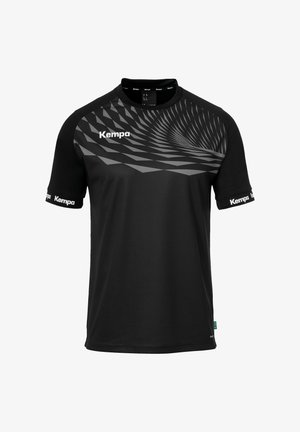 Sort kortærmet sportstrøje med et tekstureret gråt geometrisk mønster på den øverste front, med "Kempa" logoet i hvidt på ærmerne.