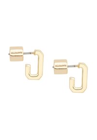 Gouden studs met een geometrisch ontwerp, bestaande uit een vierkant en een gestileerde "C"-vorm, met een gladde textuur en merkgravure.