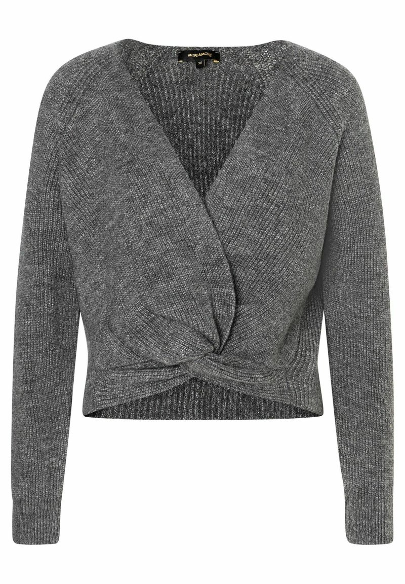 Pull enveloppant gris à manches longues, texture côtelée, et design noué à l'avant. Fabriqué en maille douce, avec un décolleté en V profond.