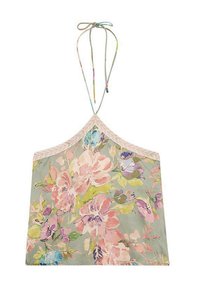 Top halter floral en verde claro con grandes flores rosas y moradas, ribete beige pálido y lazos ajustables multicolores en el cuello.