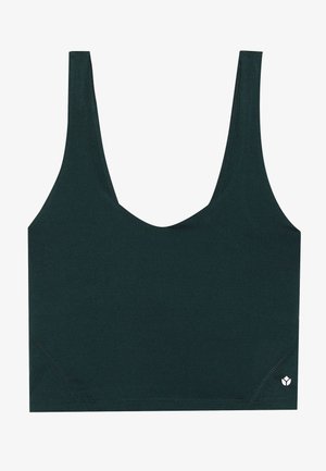 Soutien-gorge de sport vert foncé avec un décolleté rond et des bretelles larges. Texture lisse avec des coutures discrètes et un petit logo en accent sur le côté.