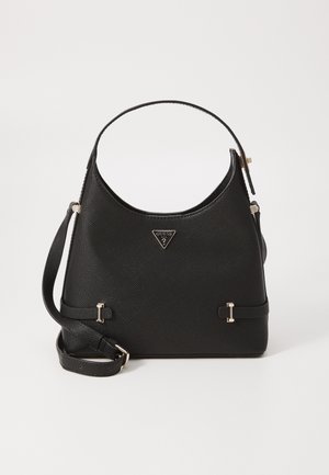 Black textured leather Guess handbag with short handle, adjustable shoulder strap, and metal logo detail on front.