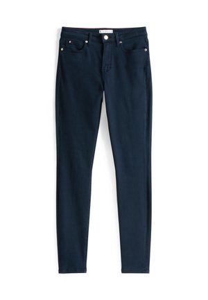 Marineblauwe jeans van denim. Slim fit met een standaard tailleband, vijf zakken en gouden hardwareaccenten op de zakken en de knoop.