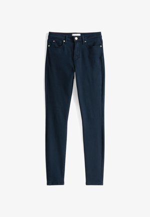 Jeansi bleumarin din denim. Croi slim cu talie standard, cinci buzunare și detalii din metal aurit pe buzunare și pe nasture.