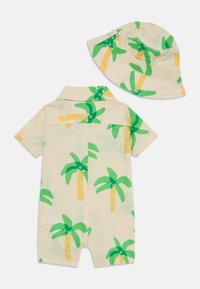 Kortärmad, ljusfärgad rompers med grönt palmträdstryck; matchande bucket hat. Mjuk tyg, kragdesign och knäppningar.