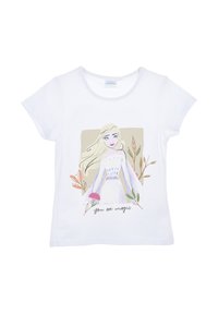 Camiseta de algodón blanca con una colorida ilustración de un personaje con cabello largo, acentos florales y el texto "tú eres magia."