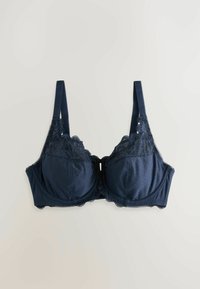 Dunkelblauer BH mit Spitzenbesatz und Punkten, ausgestattet mit verstellbaren Trägern und einem strukturierten, unterlegten Design.