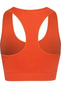Pomarańczowy sportowy crop top z designem racerback. Wykonany z gładkiego, elastycznego materiału z minimalnymi szwami i dopasowanym krojem.