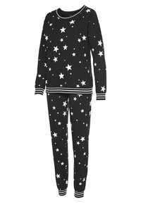 Black pajama set featuring white star pattern, long-sleeve top with striped trim, and matching pants with elastic cuffs. Soft fabric.