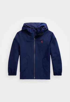 Navy blue windbreaker jacket with a hood, elastic cuffs, zippered front, two front pockets, and a red logo on the left chest.
