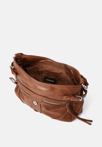 Brown leather shoulder bag with silver hardware, featuring a front zipper pocket, decorative stitching, and a spacious interior lined with fabric.