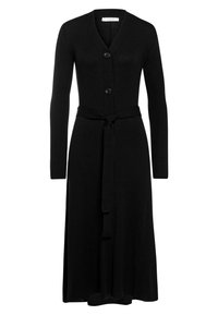 Vestito cardigan nero a coste con maniche lunghe, scollo a V, chiusura a bottoni e una cintura abbinata in vita. Presenta una gonna a lunghezza totale.