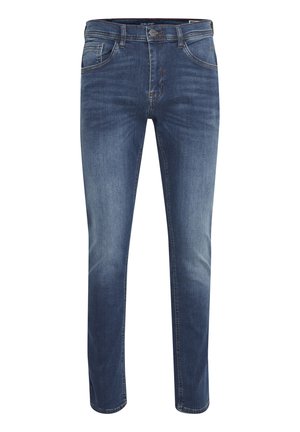 Jeans en denim bleu avec une coupe slim, présentant un design classique à cinq poches, une fermeture à bouton et un léger délavage près des genoux.