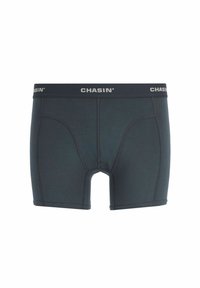 Temno sivi boxer kratki hlače iz mehkega blaga. Imajo črn pas z logotipom "CHASIN'" in kontrastno šivanje okoli nog. 