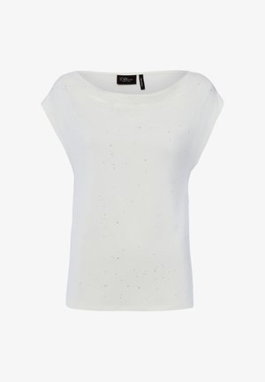 Biały damski top bez rękawów z dekoltem typu łódka i subtelnymi rozproszonymi małymi srebrnymi zdobieniami, metka marki wewnątrz kołnierza.