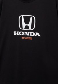 Čierne bavlnené tričko s veľkým bielym logom Honda a nápisom "CivicSi" v oranžovej farbe nižšie. Jednoduchý dizajn s okrúhlym výstrihom.