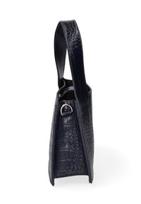 Borsa a mano in pelle effetto cocco di colore blu navy con forma strutturata, dotata di una sola tracolla e un accent metallico circolare vicino all'apertura.