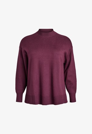 Burgundska pulover s visokim ovratnikom, dolgimi rokavi in sproščenim krojem. Mehka pletenina z rebrastim robom.