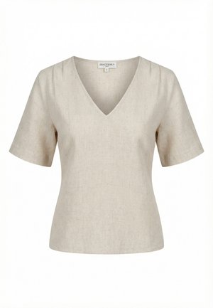 Haut pour femme beige à manches courtes et col en V, en tissu texturé léger, taille small, étiquette indiquant Grace & Mila Paris.