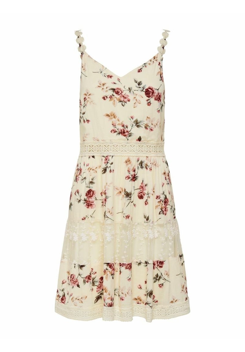 Květinové šaty z krémové tkaniny s tenkými ramínky, krajkovým lemem a patrovými volány. Malé květinové vzory v odstínech růžové a zelené.