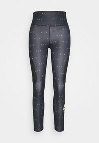 Leggings neri a vita alta con stampa multicolore "AIR", pannelli laterali in rete e logo Nike riflettente sulla parte inferiore della gamba.