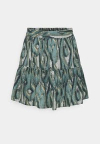 Korta utsvängda kjolen i ett blågrönt ikatmönster. Har en lagerdesign och elastisk midja. Tyget har en strukturerad yta.