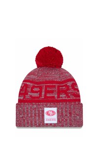 Berretto lavorato a maglia rosso con pompon sopra, caratterizzato da un motivo testurizzato e una toppa con logo che mostra "San Francisco 49ers" sul polsino.