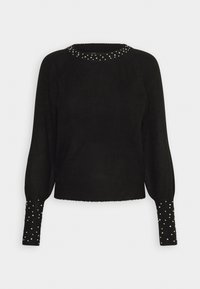 Jersey negro con cuello redondo, adornado con perlas en el cuello y puños texturizados. Tela suave, corte relajado con mangas largas.