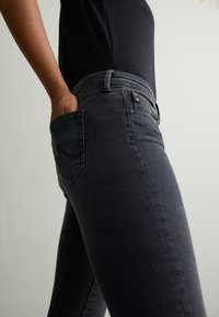 AG Jeans Vaqueros pitillo - black