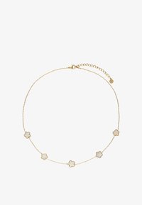 Seleccionado, gold coloured