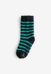 Calzino morbido blu navy con strisce orizzontali color teal e puntini di presa in gomma sulla suola, caratterizzato da una consistenza spessa e morbida e una fascia a coste.
