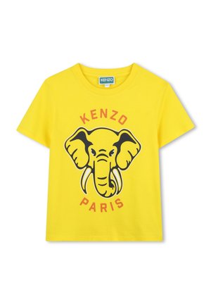 T-shirt en coton jaune avec un graphique d'éléphant noir, le texte rouge "KENZO" et "PARIS" en dessous, manches courtes et col rond.