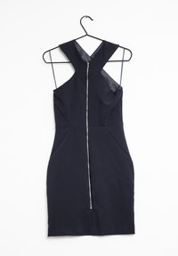 Marineblaue ärmellose Kleid mit Reißverschluss vorne, das eine figurbetonte Silhouette, einen Ausschnitt an den Schultern und Eingrifftaschen aufweist.