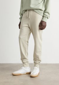 BOSS - SECHUP - Tracksuit bottoms - light beige Thumbnail Image 1
