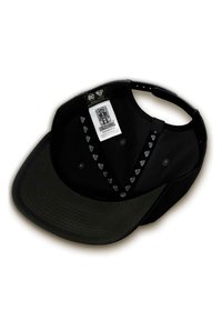 Black cap with a flat brim, featuring a textured black underside, logo accents, and an adjustable strap. Interior includes brand tags.