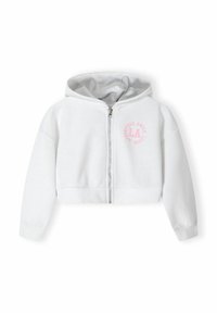 Felpa bianca accorciata con chiusura a zip, cappuccio e testo stampato rosa sul lato sinistro del petto. Realizzata in un morbido tessuto testurizzato.