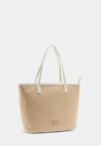 Beige shopper met patroon, dubbele crèmekleurige handvatten en een klein gouden "Liu Jo Milano" logo aan de voorkant, geïsoleerd op een lichte achtergrond.