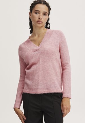 Rosa Pullover mit langen Ärmeln und tiefem V-Ausschnitt, aus weichem, strukturiertem Material, mit leicht verkürztem Saum und minimalistischem Design.