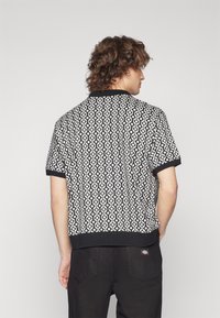 Obey Clothing TESTAMENT BUTTON FRONT POLO UNISEX - Blusa - black multi