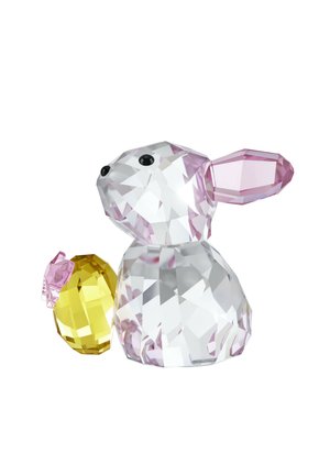 Duidelijk en gefacetteerd kristallen beeldje van een konijn met roze oren en zwarte ogen, zittend naast een geel kristallen ei met een roze strik.