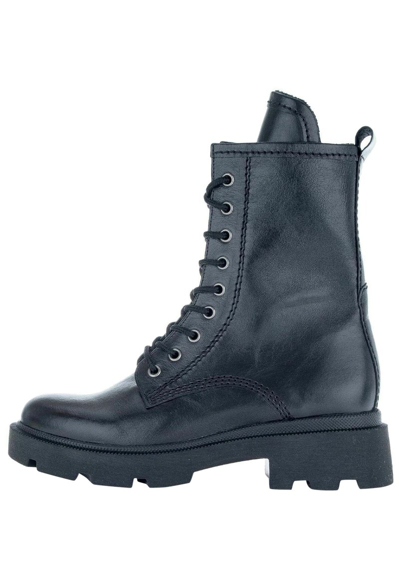 Black leather ankle boot with a chunky sole, round toe, and side zipper. Features metal eyelets and laces along the front.