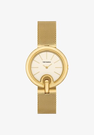 Goudkleurige Tory Burch polshorloge met mesh band, minimalistische wijzerplaat zonder cijfers, gouden markeringen en een lusdetail aan de onderkant van de ronde wijzerplaat.