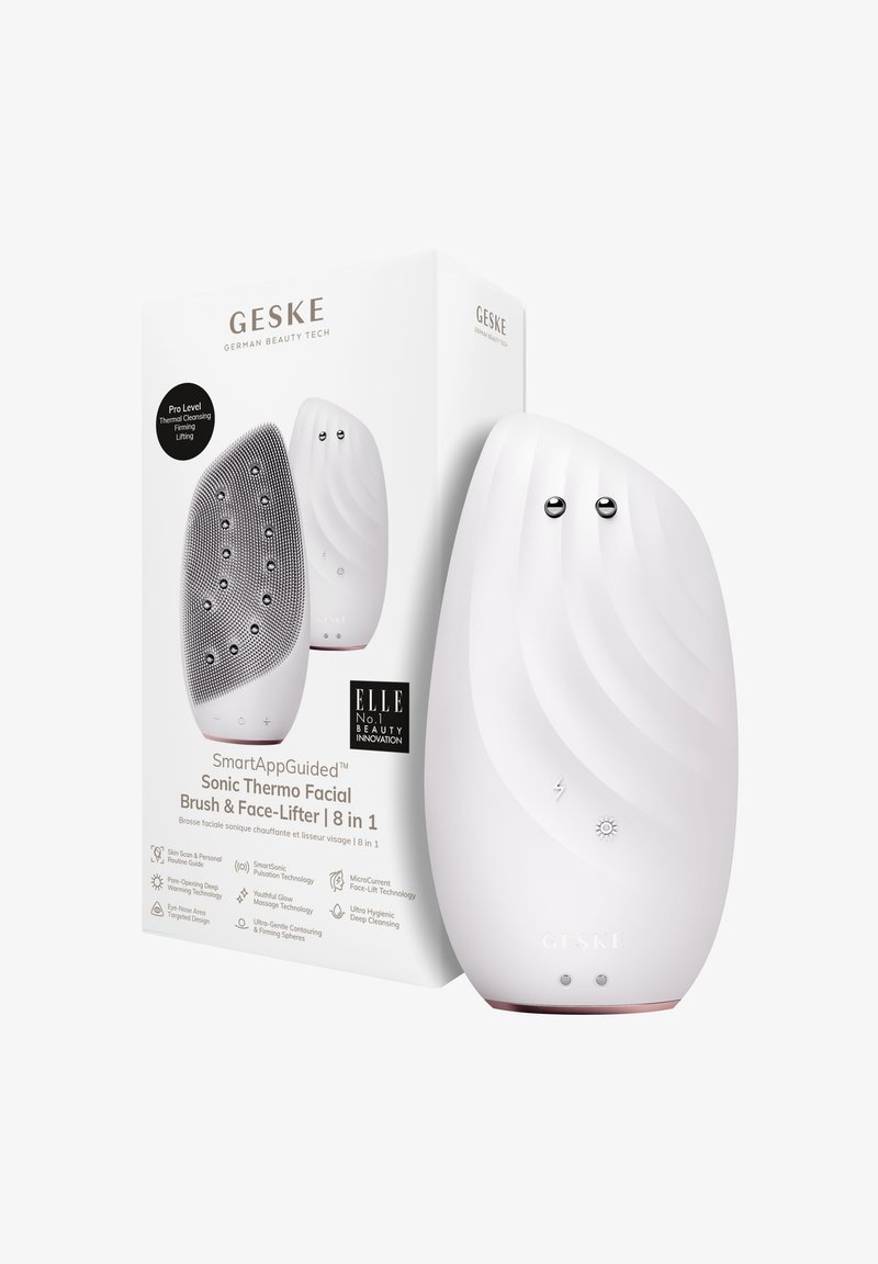 Sonic gezichtsborstel en gezichtslifter in het wit, met een gebogen ergonomische vorm, een gestructureerd oppervlak en twee metalen knoppen aan de voorkant.