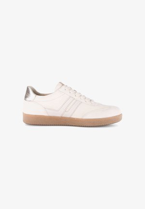 Off-white low-top sneaker with light brown rubber sole, lace-up front, side stitching detail, and metallic silver heel accent.