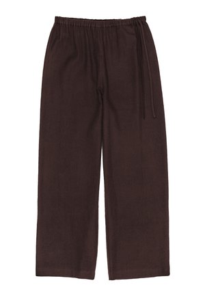 Tumed pruunid, laiad püksid, mis on valmistatud tekstuursetest materjalidest. Elastne vöökoht reguleeritava sobivuse jaoks, paelaga. Nähtavaid taskuid pole.